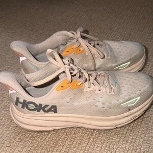 Hoka Beige and Orange Athletic Shoes